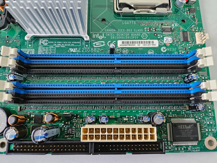 Intel E210882 Socket T LGA775 Desktop Motherboard ( C64123-502 D915GAG D915PSY ) USED