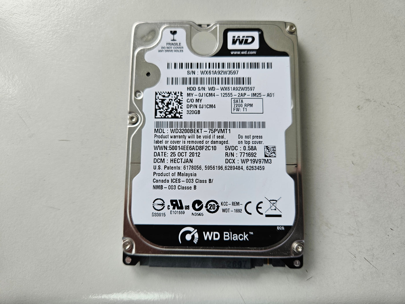 Western Digital Dell 320GB 7200PRM SATA 2.5in HDD ( WD3200BEKT-75PVMT1 0J1CM4 ) REF