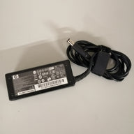 HP AC ADAPTER PPP009H 240 V IN 18.5 V OUT ( P/N 463552-002 USED)