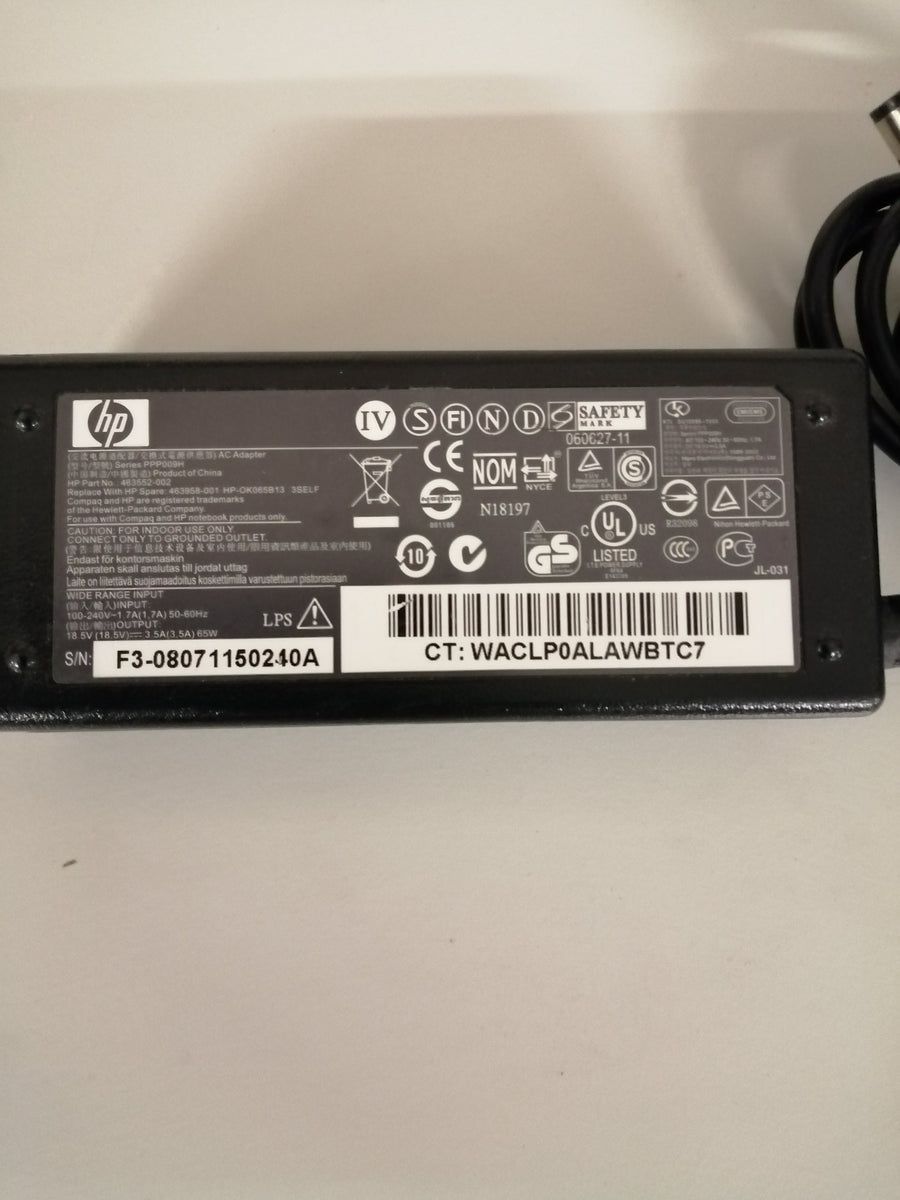 HP AC ADAPTER PPP009H 240 V IN 18.5 V OUT ( P/N 463552-002 USED)