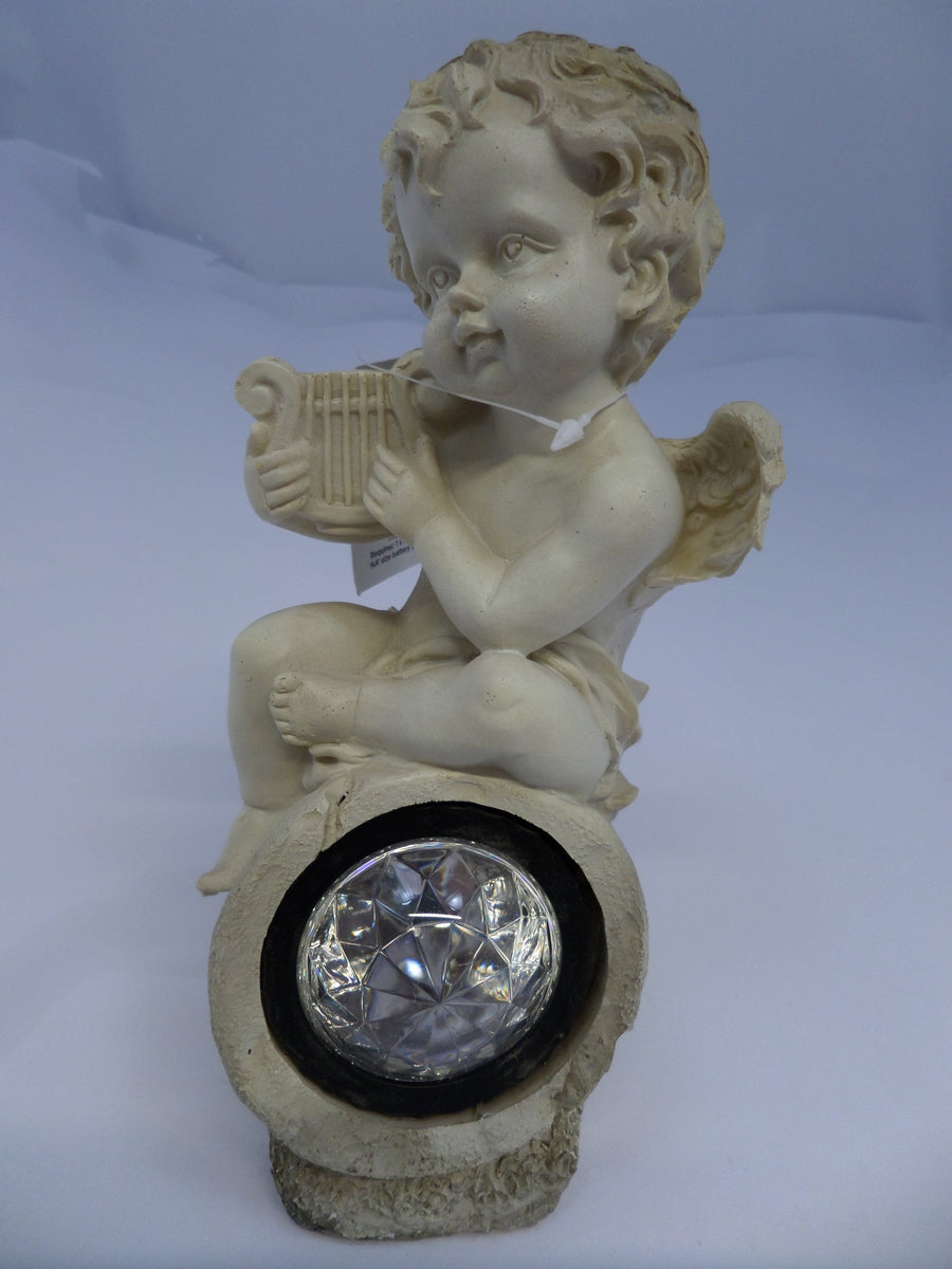 BS122163 - Premier cherub with solar white light. Harp Design - USED