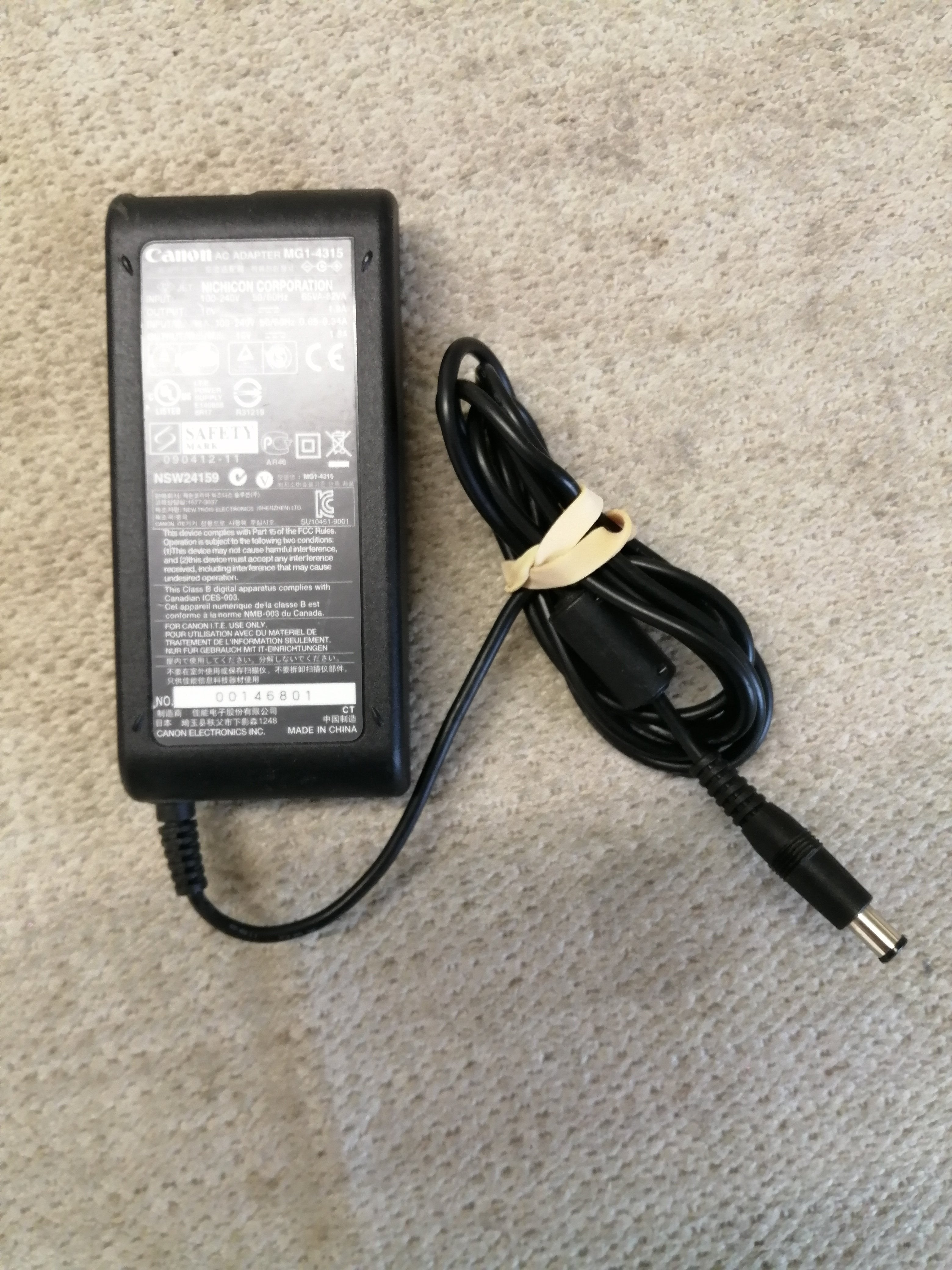CANON AC ADAPTER IN 240V 65VA-82VA OUT 16V 1.8A ( MG1-4315 USED )