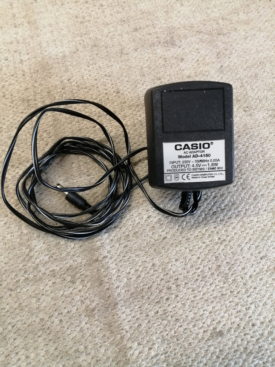 CASIO AC ADAPTOR IN 230V 0.05A OUT 4.5V 1.8W ( AD-4150 USED )