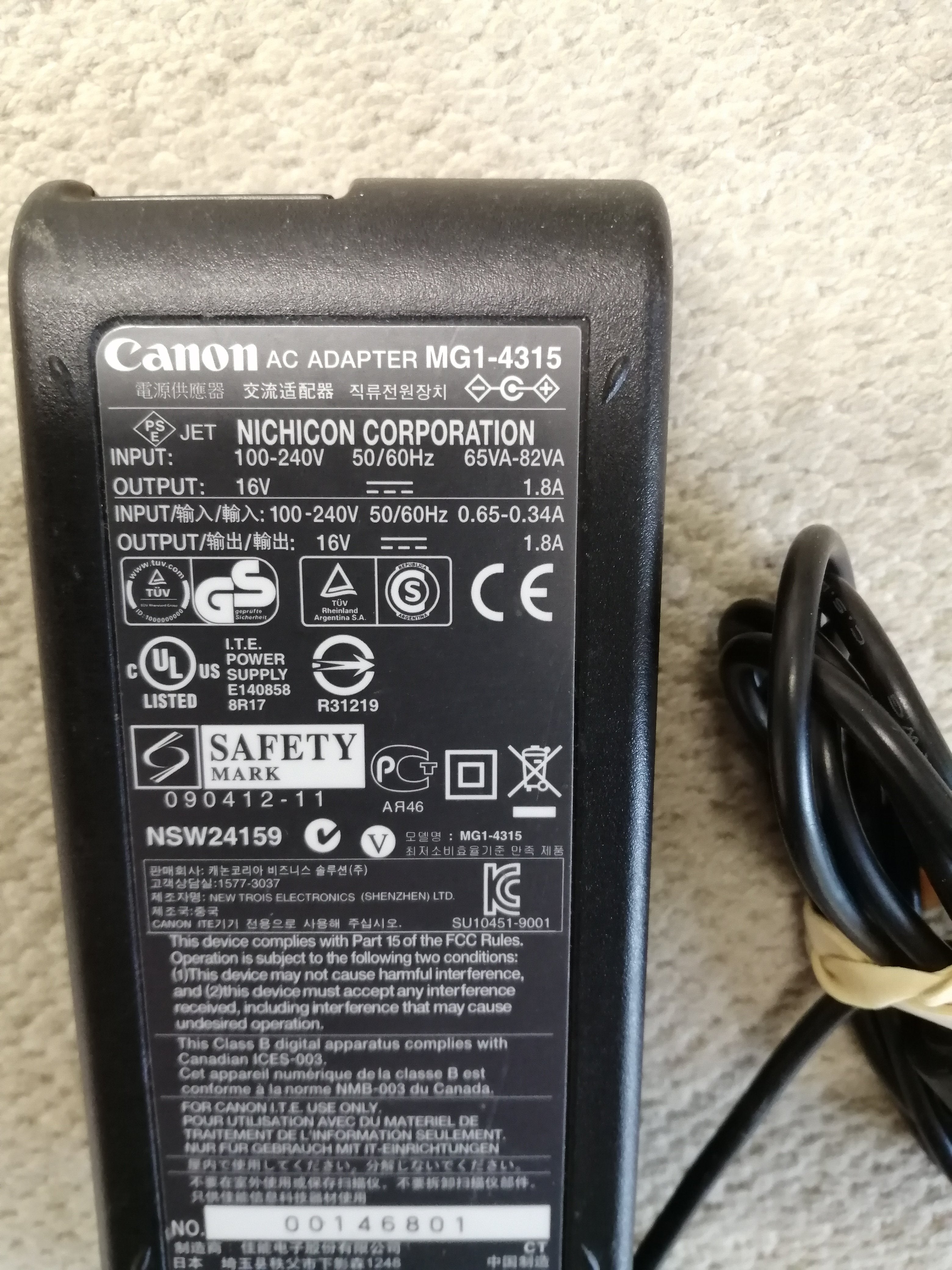 CANON AC ADAPTER IN 240V 65VA-82VA OUT 16V 1.8A ( MG1-4315 USED )