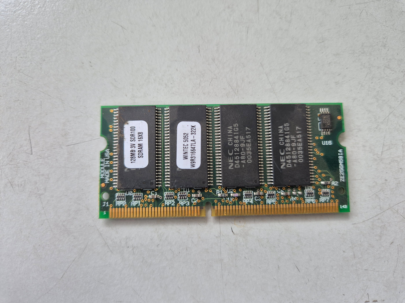 Wintec 128MB PC100 100MHz Non-ECC Unbuffered 144-Pin SODIMM ( W9R316647LA-322K ) REF