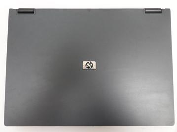 nx7300 - HP nx7300 No Ram 1.6ghz No HDD Laptop - Dark Gray – Without PSU – No Drives – No HDD Caddy – Powers But Wont Boot – No Ram Cover - Cracked Hinges - Missing Key - SPR