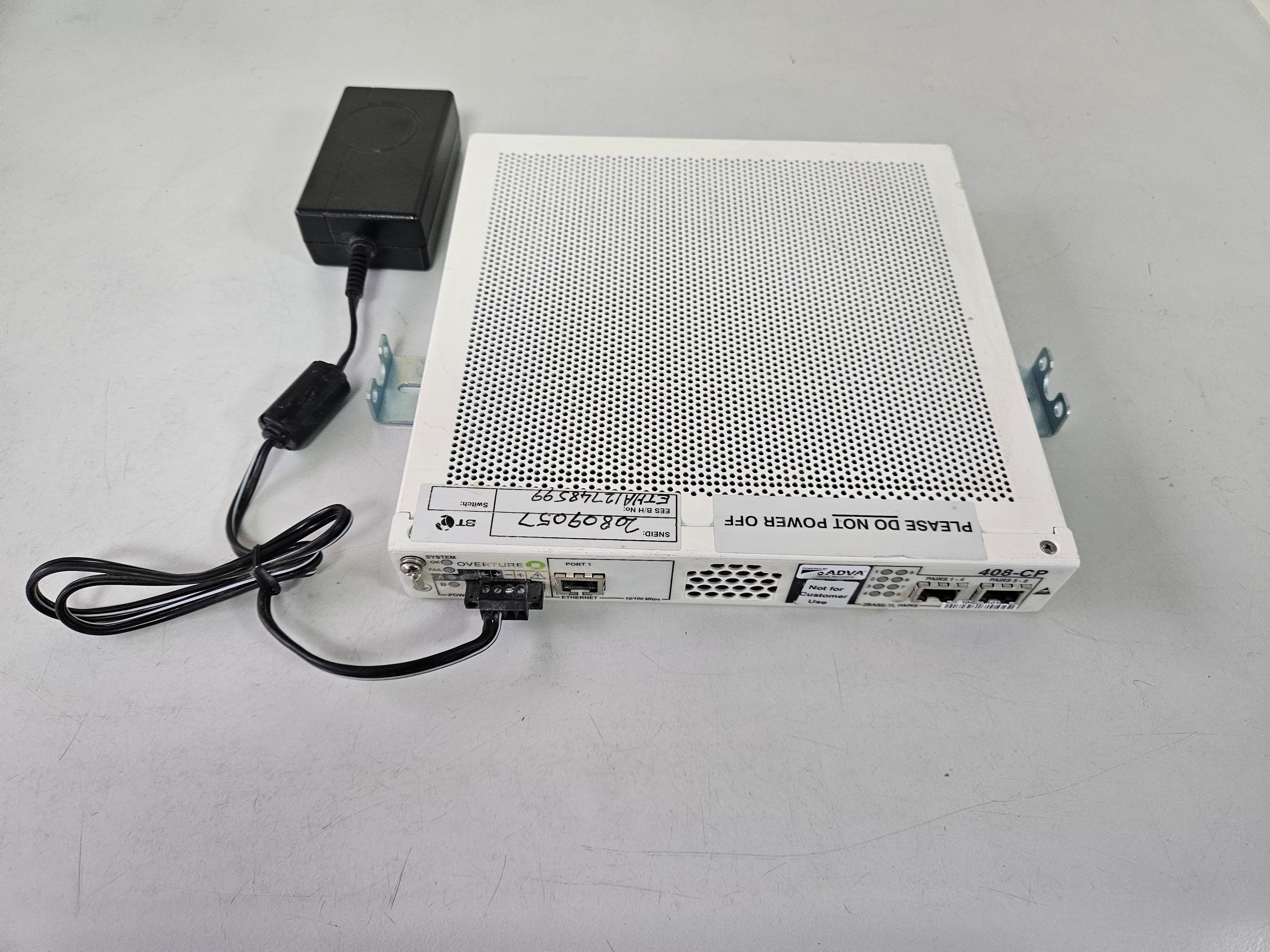 Overture Network High Speed Enterprise Ethernet Modem W/PSU ( HN408-CP-1E 920401-2005-07 ) USED