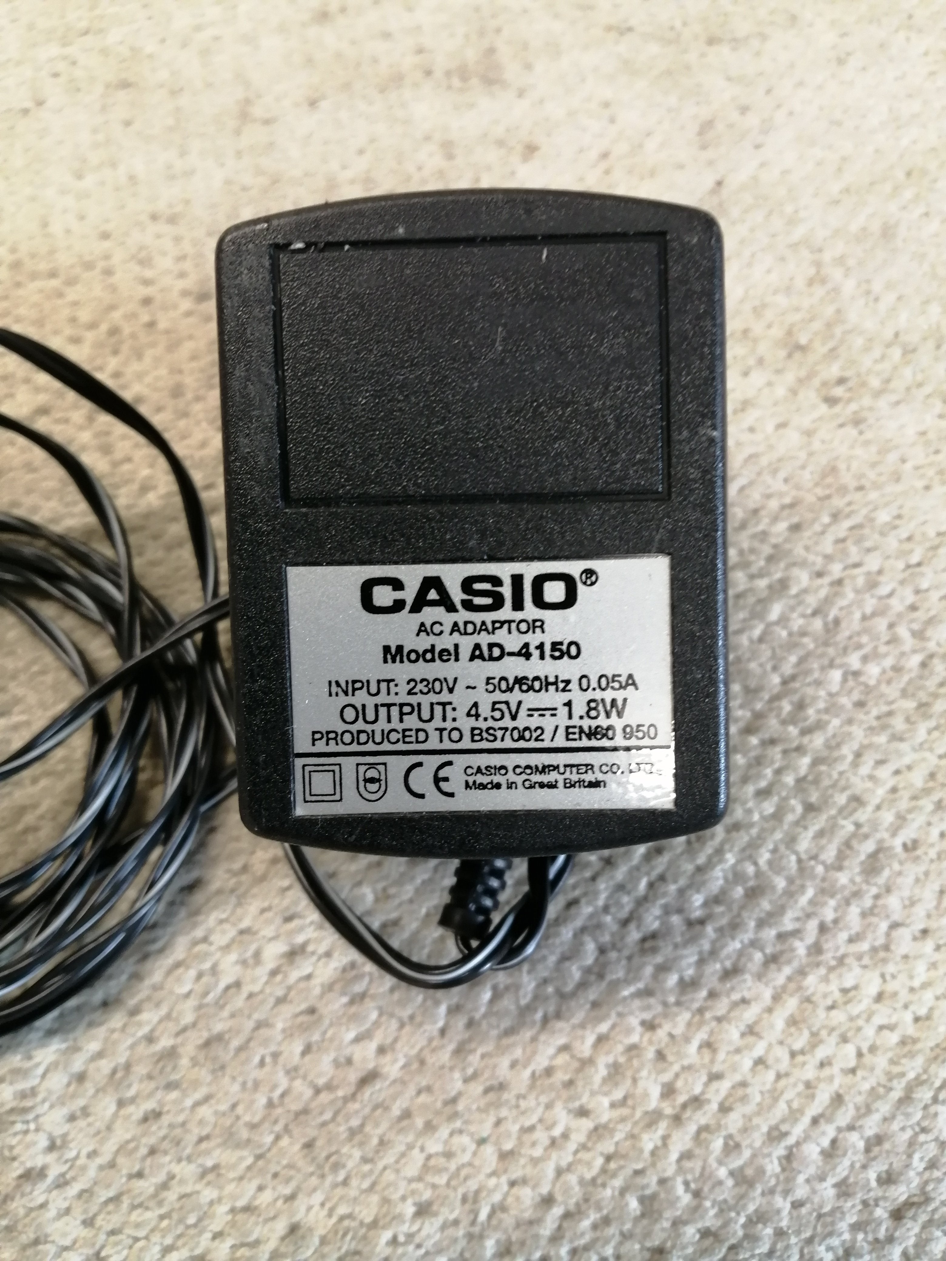 CASIO AC ADAPTOR IN 230V 0.05A OUT 4.5V 1.8W ( AD-4150 USED )