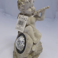 BS122163 - Premier cherub with solar white light. Violin Design - USED